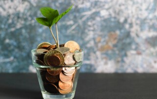 a jar full of money for a blog about how much a prosecutor makes