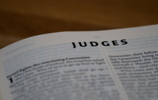 photo of a book open with the word judge on it